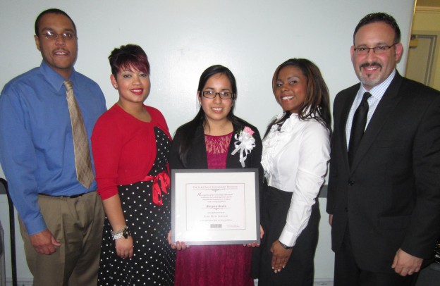 Margaret Seclen, center, with previous recipients, from left, Desi Nesmith, Violet Jiménes Sims, Dr. Santosha Oliver, Dr. Miguel Cardona